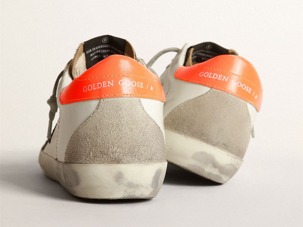 GOLDEN GOOSE Super-Star sneakers with leopard-print insert, glittery star and orange heel tab