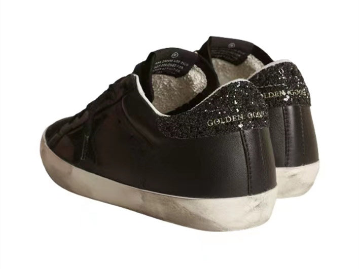 GOLDEN GOOSE Super-Star in black nappa with black star and glitter heel tab