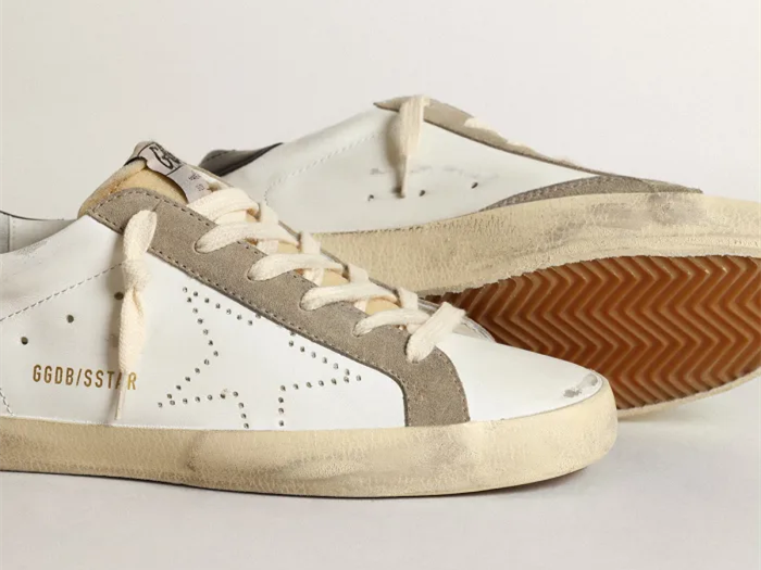 GOLDEN GOOSE Super-Star sneakers with perforated star and glossy midnight-blue leather heel tab