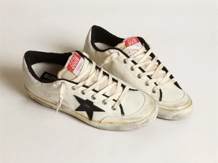 GOLDEN GOOSE Super-Star LTD sneakers in beige canvas with black leather star and white leather heel tab