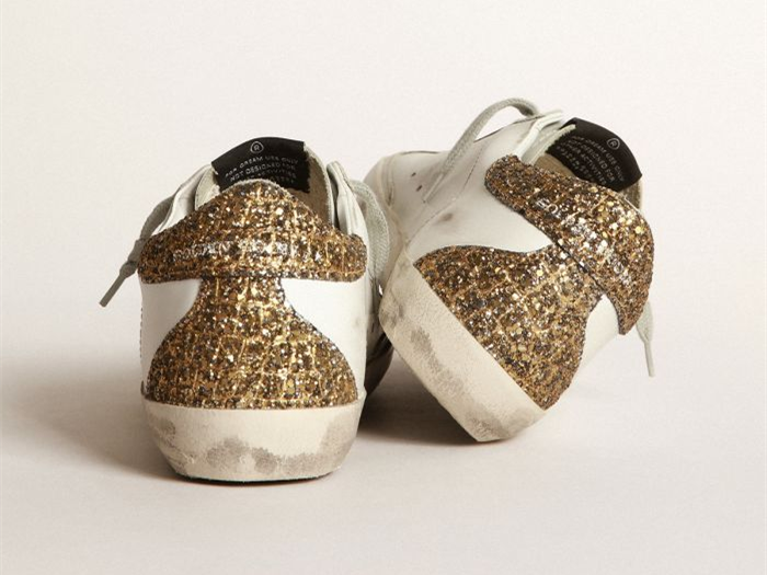 GOLDEN GOOSE Super-Star sneakers with light blue leather star and gold glitter crocodile-print heel tab