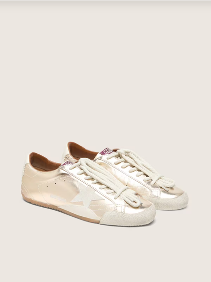 Golden Goose True-Star in metallic platinum leather with light gray suede star