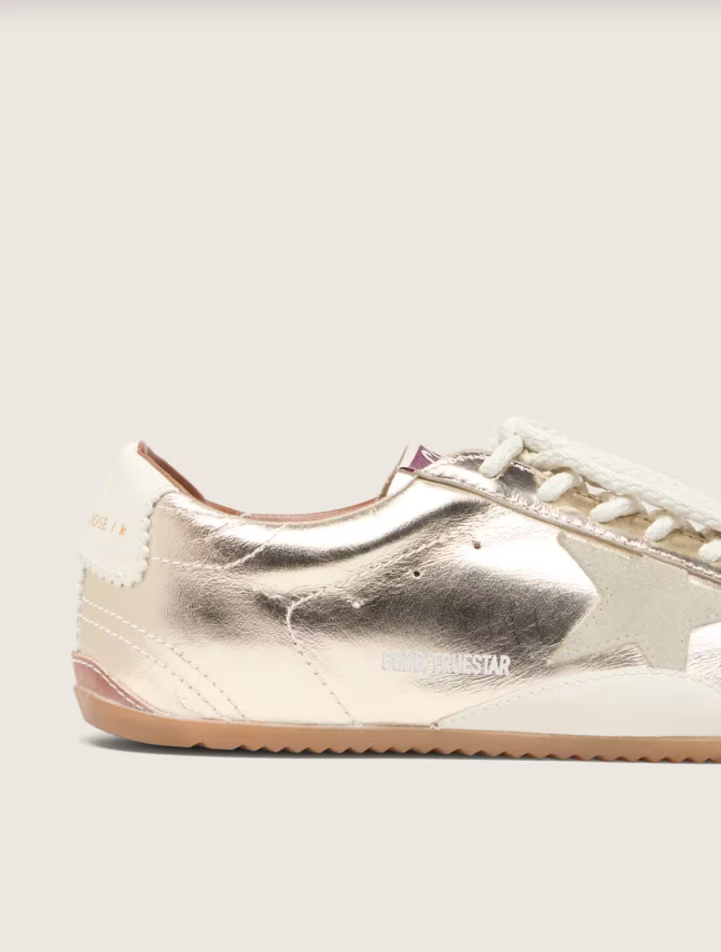 Golden Goose True-Star in metallic platinum leather with light gray suede star