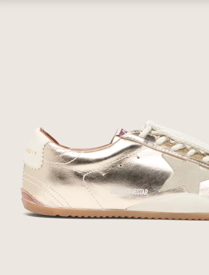 Golden Goose True-Star in metallic platinum leather with light gray suede star