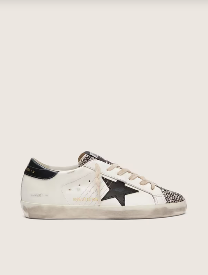Golden Goose Super-Star LTD in white leather with black star and pony skin details