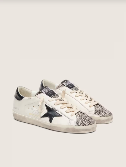 Golden Goose Super-Star LTD in white leather with black star and pony skin details