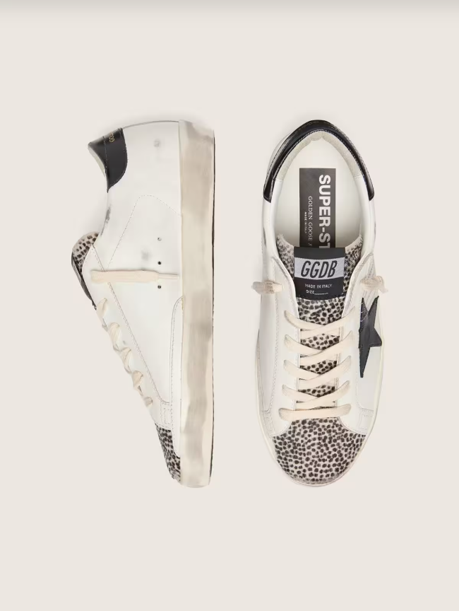 Golden Goose Super-Star LTD in white leather with black star and pony skin details