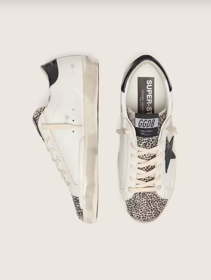 Golden Goose Super-Star LTD in white leather with black star and pony skin details