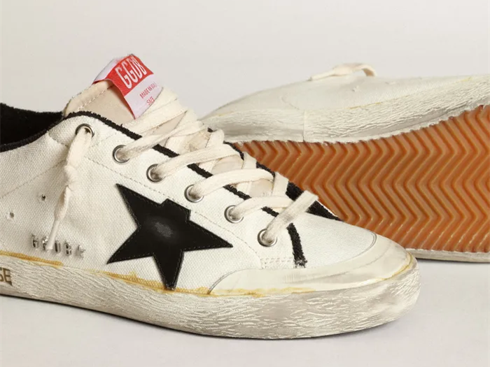 GOLDEN GOOSE Super-Star LTD sneakers in beige canvas with black leather star and white leather heel tab